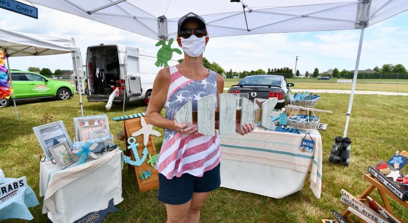 Meghan McCalley of Meghan’s Collection in Milton features local wood art inspired by the ocean.